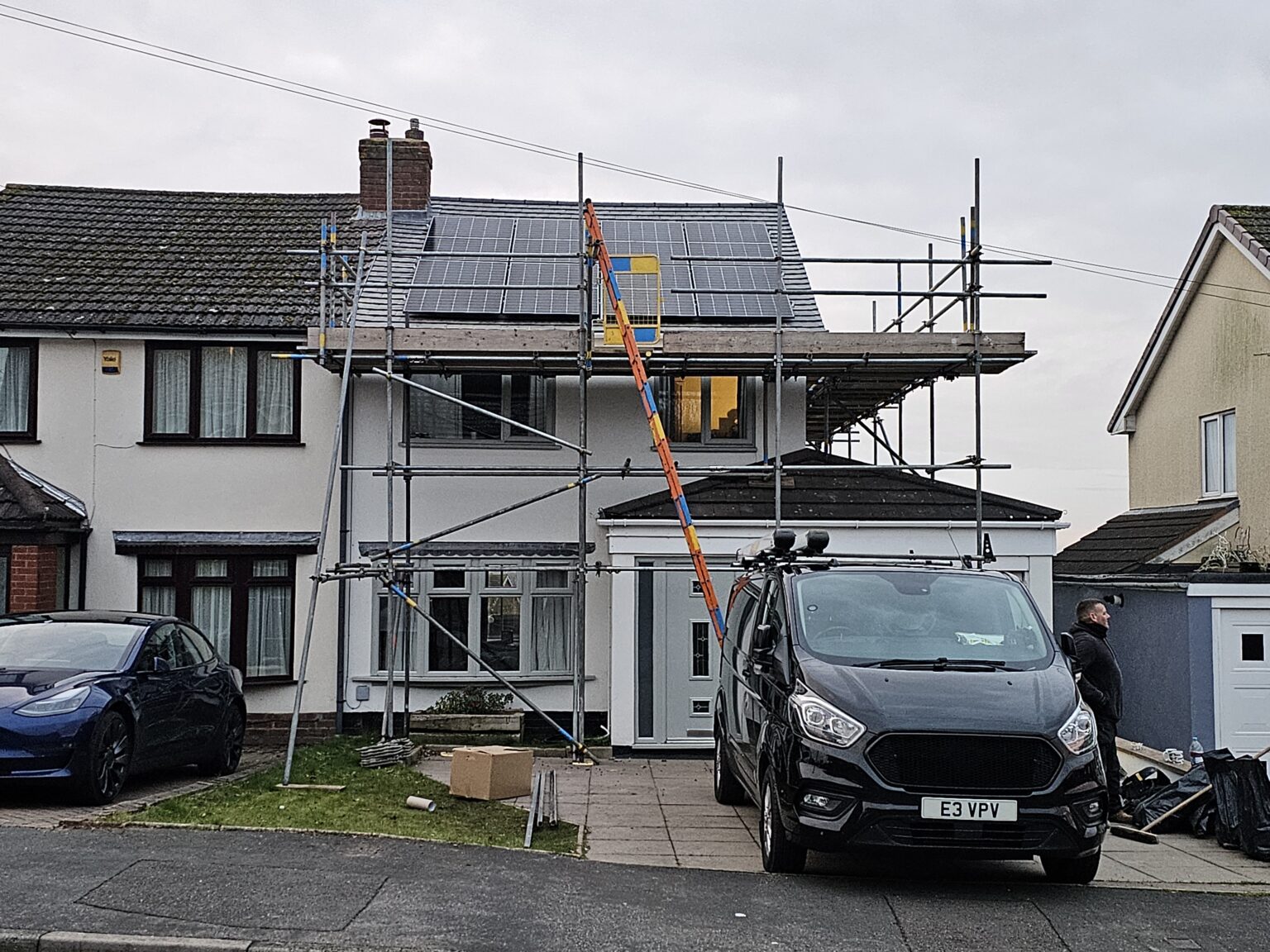 Solar Panel Installers Installing solar panels onto a roof