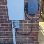 Hypervolt Black on wall