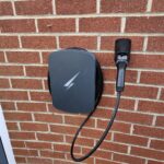 Hypervolt Black on wall