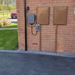 Hypervolt Black on wall