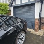 Hypervolt Black on wall