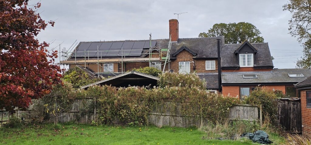 Solar Panels on a roof with scaffold