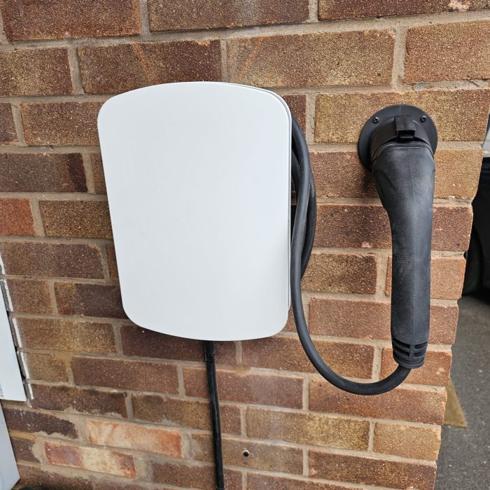 White Hypervolt fixed on brick wall